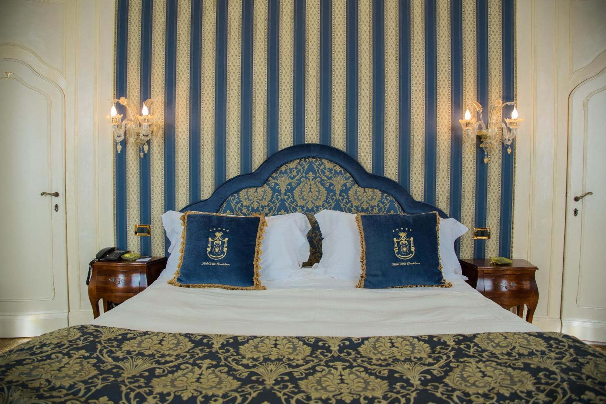 호텔 빌라 콘둘메르 몰리아노베네토 객실 사진 A bedroom at the hotel